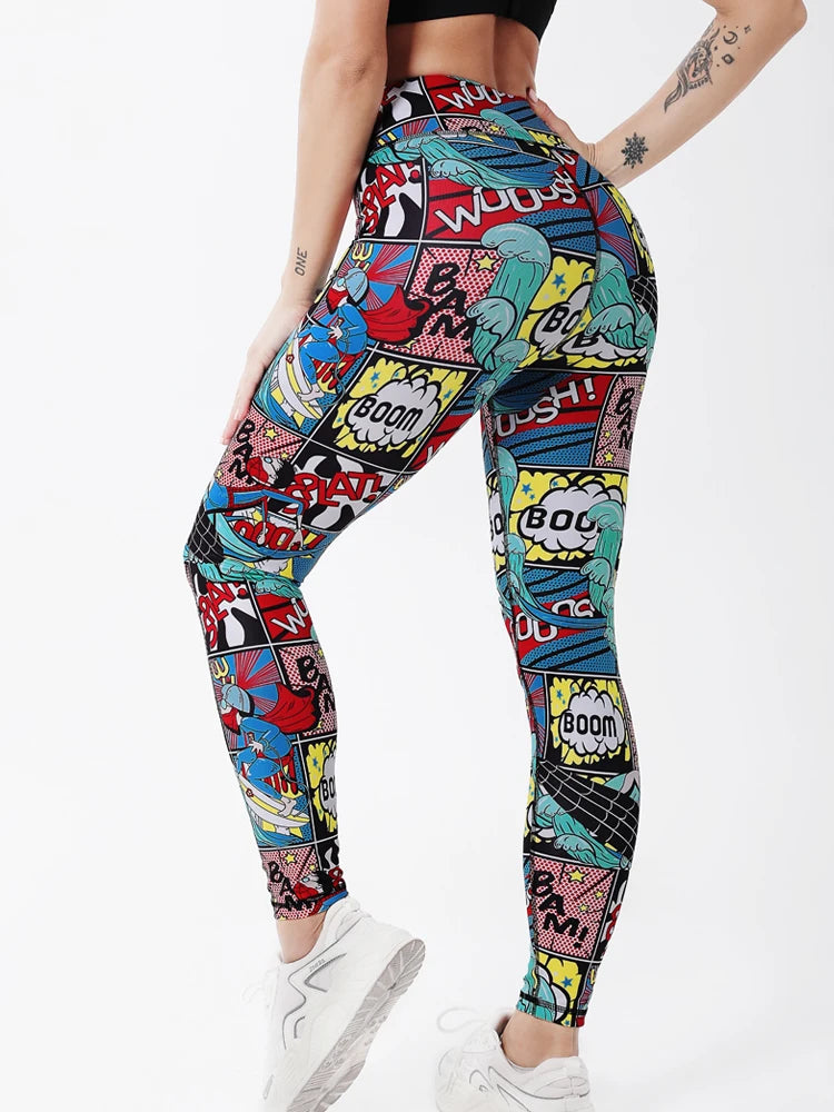 Colorful comic book-style leggings worn by a person on a white background